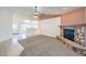 Inviting living room with a cozy stone fireplace at 5231 E Chasemoor St, Pahrump, NV 89061