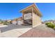 Home with an RV parking area, a wide driveway, and a two-car garage at 5231 E Chasemoor St, Pahrump, NV 89061