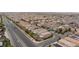An aerial of a neighborhood featuring homes with solar panels, and a lush environment at 5409 Holding Ave, Las Vegas, NV 89139