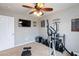 Home exercise room featuring workout machines and motivational posters, designed for fitness at 5409 Holding Ave, Las Vegas, NV 89139