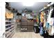 Walk-in closet features custom shelving and ample storage for clothes, shoes, and accessories, maximizing organization at 5409 Holding Ave, Las Vegas, NV 89139