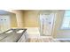 Bathroom featuring dual sinks, large soaking tub, and walk-in shower at 6348 Blue Twilight Ct, Las Vegas, NV 89108