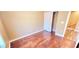 An inviting bedroom with hardwood floors, a large sliding closet, and ample space at 6348 Blue Twilight Ct, Las Vegas, NV 89108