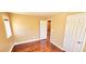 A bedroom with hardwood flooring and white trim at 6348 Blue Twilight Ct, Las Vegas, NV 89108