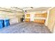 Spacious garage with cabinets and storage shelving for organization at 6348 Blue Twilight Ct, Las Vegas, NV 89108