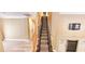 Carpeted stairway with wood banister and white trim, leading to the upper level at 6348 Blue Twilight Ct, Las Vegas, NV 89108