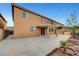 The home features a large backyard with concrete patio, landscaping, and stucco exterior at 7216 Campolina Ct, Las Vegas, NV 89113