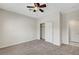 Bedroom with carpet, ceiling fan, closet and ensuite bathroom at 7216 Campolina Ct, Las Vegas, NV 89113
