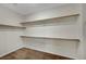 Walk-in closet with built-in shelving and ample storage space at 7216 Campolina Ct, Las Vegas, NV 89113