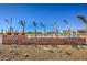 Community sign for Galaxy Park, surrounded by desert landscaping and palm trees at 7477 Onyx Star St, North Las Vegas, NV 89084