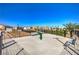 Community dog park area featuring seating, water features, and waste disposal for residents and their pets at 7477 Onyx Star St, North Las Vegas, NV 89084