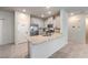 Well-equipped kitchen featuring stainless steel appliances, granite countertops, and ample storage at 7477 Onyx Star St, North Las Vegas, NV 89084