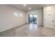 Open kitchen features sliding glass door to backyard and walk-in pantry at 7477 Onyx Star St, North Las Vegas, NV 89084