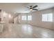 Open-concept living space with tile floors, recessed lighting, and a ceiling fan at 7477 Onyx Star St, North Las Vegas, NV 89084