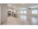 Open floor plan connects to kitchen with stainless appliances and plenty of space at 7477 Onyx Star St, North Las Vegas, NV 89084