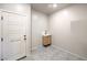 Mud room features tile floor, storage and small sink at 7477 Onyx Star St, North Las Vegas, NV 89084
