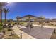 Community picnic area featuring shaded seating, barbecue grills, and landscaped grounds for gatherings at 7477 Onyx Star St, North Las Vegas, NV 89084