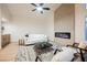 Bright living room with a modern fireplace, vaulted ceiling, and stylish furniture at 7695 Silver Wells Rd, Las Vegas, NV 89149