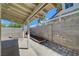 Backyard featuring a covered patio and a block wall, offering a private outdoor space at 8329 Telescope Peak Ct, Las Vegas, NV 89145