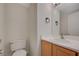 Bathroom featuring a vanity with a sink and toilet at 8329 Telescope Peak Ct, Las Vegas, NV 89145