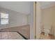 Cozy bedroom with neutral carpet and ample natural light at 8329 Telescope Peak Ct, Las Vegas, NV 89145