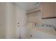 Bright laundry area features a washer, dryer, and storage at 8329 Telescope Peak Ct, Las Vegas, NV 89145