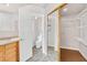 Bathroom with marble floors, granite countertops and access to the closet at 8912 Galena Crossing St, Las Vegas, NV 89123