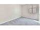 Bedroom with neutral carpet, closet and large window at 8912 Galena Crossing St, Las Vegas, NV 89123