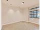 Bedroom with hardwood floors, bright light and a large window at 8912 Galena Crossing St, Las Vegas, NV 89123