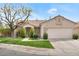 Charming single-story home with desert landscaping and a two-car garage in a residential neighborhood at 8912 Galena Crossing St, Las Vegas, NV 89123