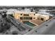 Aerial shot highlighting the modern home, solar panels, pool, and the surrounding neighborhood at 9780 Solar Ave, Las Vegas, NV 89149