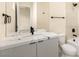 Modern bathroom featuring a marble countertop, sleek black fixtures, and a contemporary design at 9780 Solar Ave, Las Vegas, NV 89149