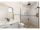 Modern bathroom with marble countertop and shower at 9780 Solar Ave, Las Vegas, NV 89149