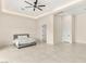 Airy bedroom showcasing tile flooring, a ceiling fan, and contemporary design at 9780 Solar Ave, Las Vegas, NV 89149