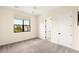 Bedroom featuring neutral carpet, and a window at 9780 Solar Ave, Las Vegas, NV 89149