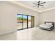 Bright bedroom with a pool view, ceiling fan, and neutral tile flooring at 9780 Solar Ave, Las Vegas, NV 89149