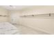 Spacious walk-in closet with ample storage space and a center island at 9780 Solar Ave, Las Vegas, NV 89149