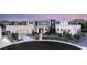Contemporary home featuring a manicured front yard and a multi-car garage at 9780 Solar Ave, Las Vegas, NV 89149