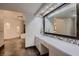 Bathroom with mosaic mirror and double sink vanity at 1 Quail Run Rd, Henderson, NV 89014