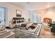 Large bedroom with stone floors, fireplace, and private patio access at 1 Quail Run Rd, Henderson, NV 89014