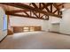 Spacious bonus room with beamed ceilings and built in cabinets at 1 Quail Run Rd, Henderson, NV 89014