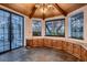 Breakfast nook with large windows, built-in cabinetry, and tile floors at 1 Quail Run Rd, Henderson, NV 89014
