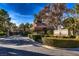 Chail Ridge Estates entrance with lush landscaping, guard house, and security gate at 1 Quail Run Rd, Henderson, NV 89014