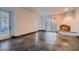 Large living room featuring stone flooring and a fireplace at 1 Quail Run Rd, Henderson, NV 89014