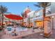 The District splash pad, outdoor seating, and palm trees add to this urban oasis at 1 Quail Run Rd, Henderson, NV 89014