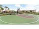 Outdoor basketball court and playground with lush landscaping, offering recreational opportunities for residents of all ages at 12126 Azure Gate Rd # 1, Las Vegas, NV 89183