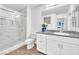 Clean and bright bathroom with a glass-enclosed shower and a white vanity at 12126 Azure Gate Rd # 1, Las Vegas, NV 89183