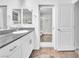 Modern bathroom featuring a glass-enclosed shower and a white vanity at 12126 Azure Gate Rd # 1, Las Vegas, NV 89183