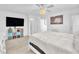 Bright bedroom with a ceiling fan and a cozy bed with a fluffy white blanket at 12126 Azure Gate Rd # 1, Las Vegas, NV 89183