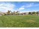 A vast community park features a playground, basketball court, and grassy fields, creating a vibrant and active community at 12126 Azure Gate Rd # 1, Las Vegas, NV 89183